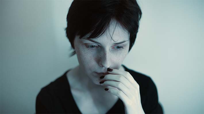 Mujer con el síndrome del burnout